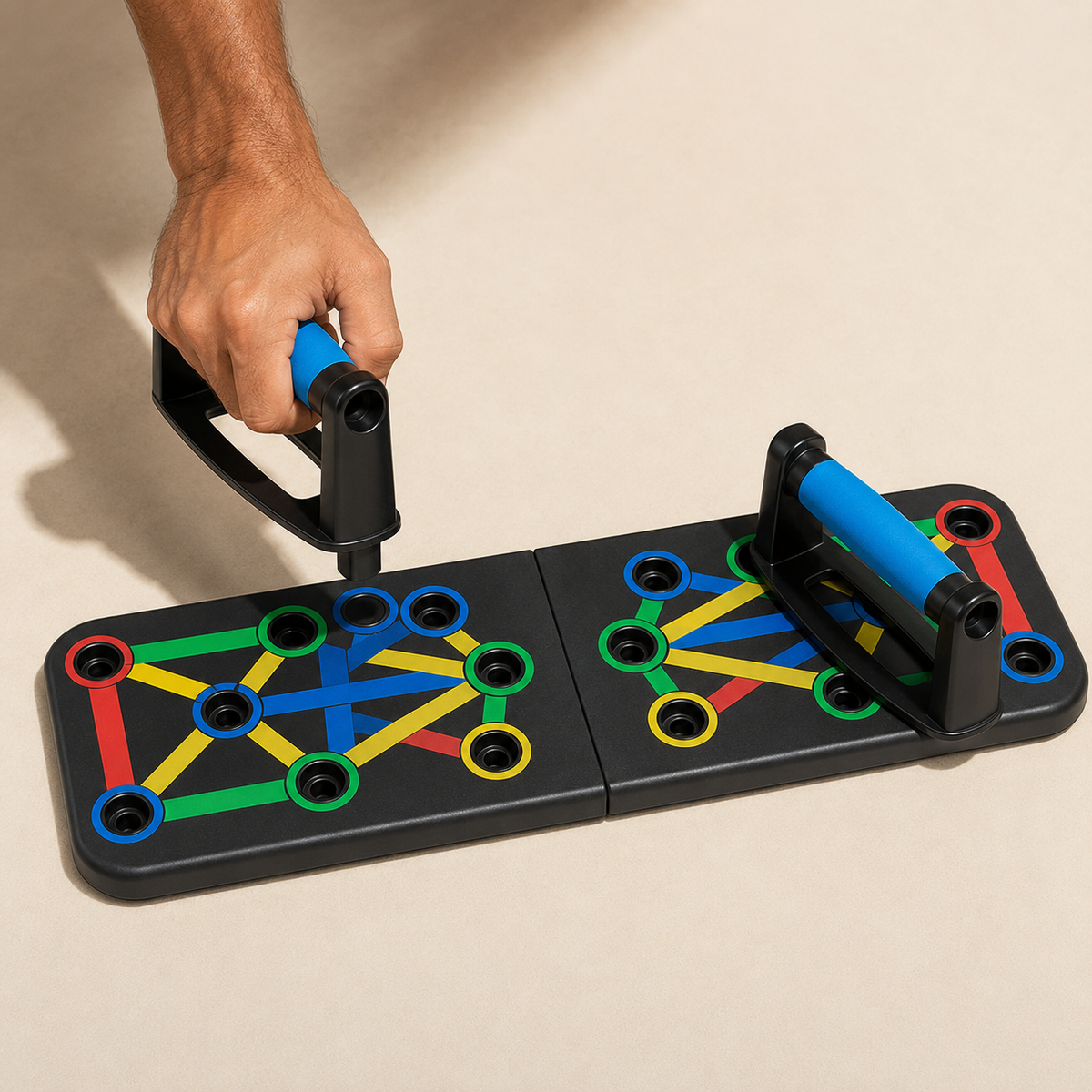Moving the removable handles between colour-coded push-up board slots