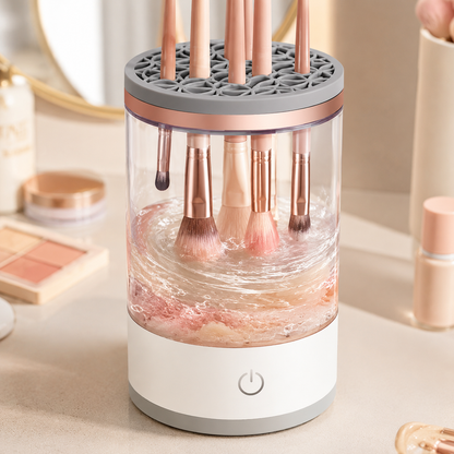 Makeup brushes being cleaned by circulating water inside the transparent bowl